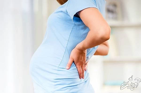 کمر درد از عوارض کفش پاشنه بلند در بارداری کمردرد بارداری